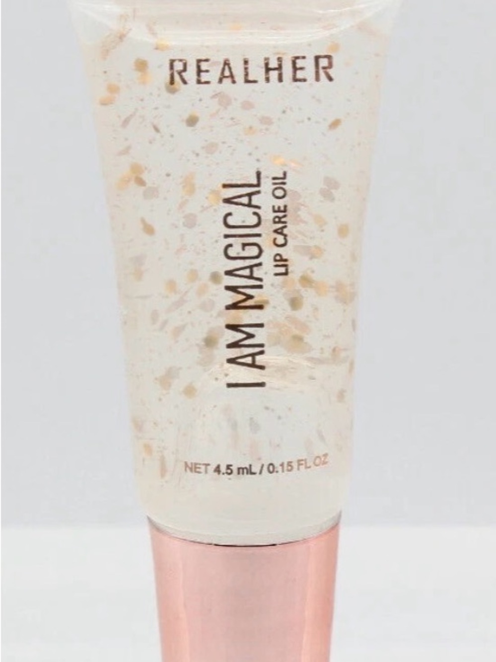 RealHer I Am Magical Lip Care Oil - Black with Rose Gold Text
